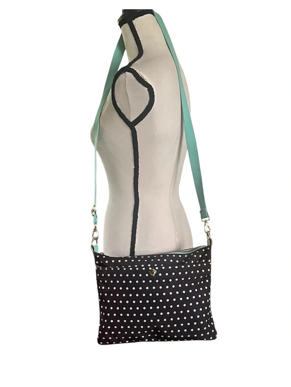 Fossil Keyper polka dot crossbody with mint aqua adjustable strap.